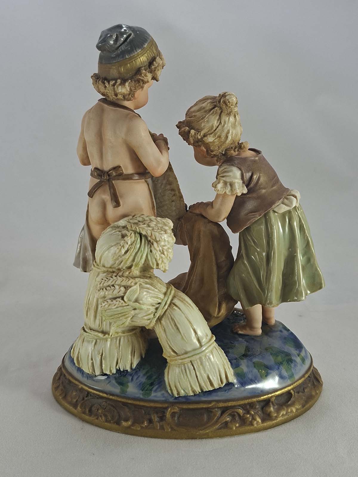 Figurine of Children Gathering Nuts by Ernst Wahliss - Image 3